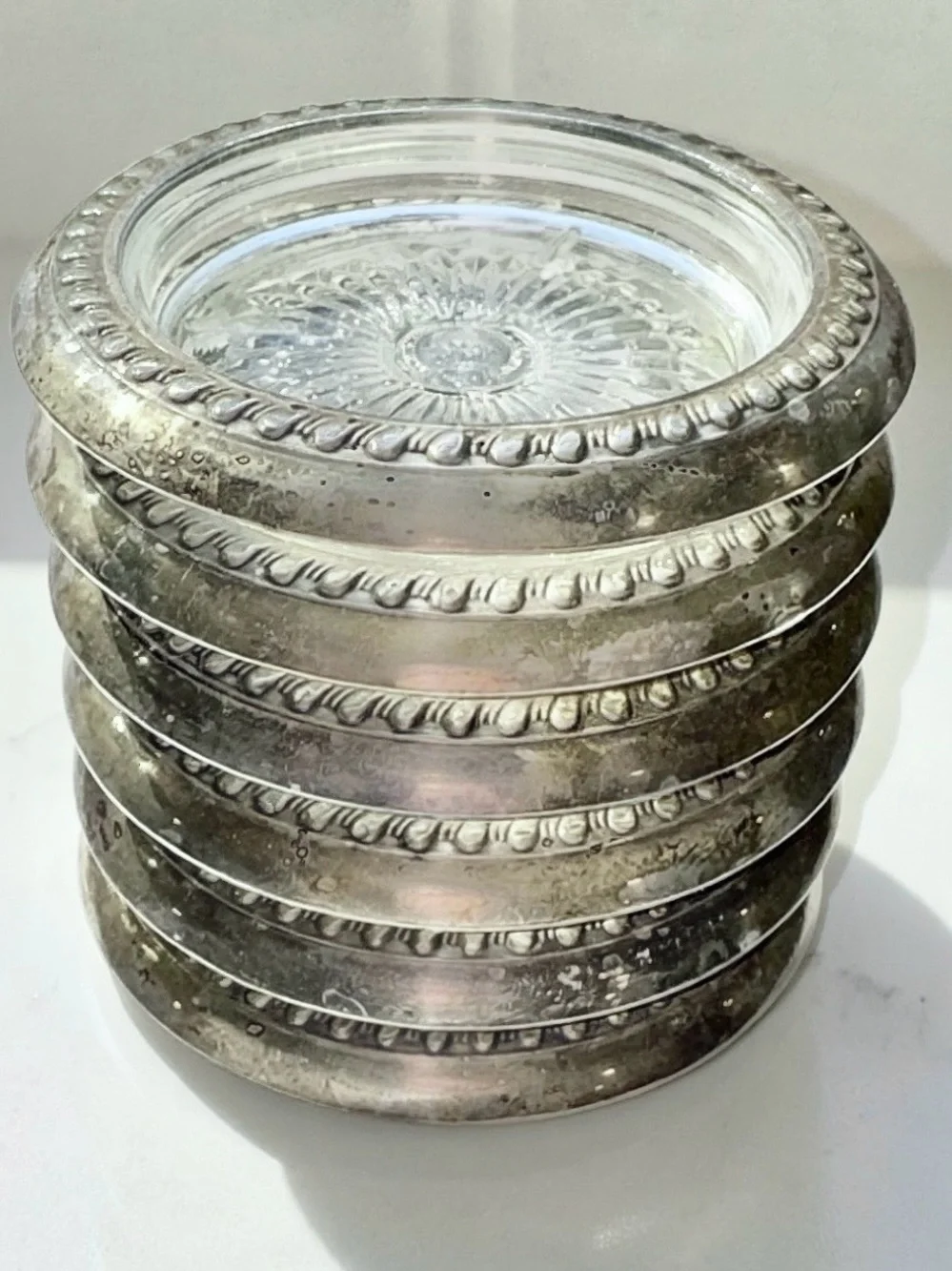 6 Sterling silver rimmed coasters